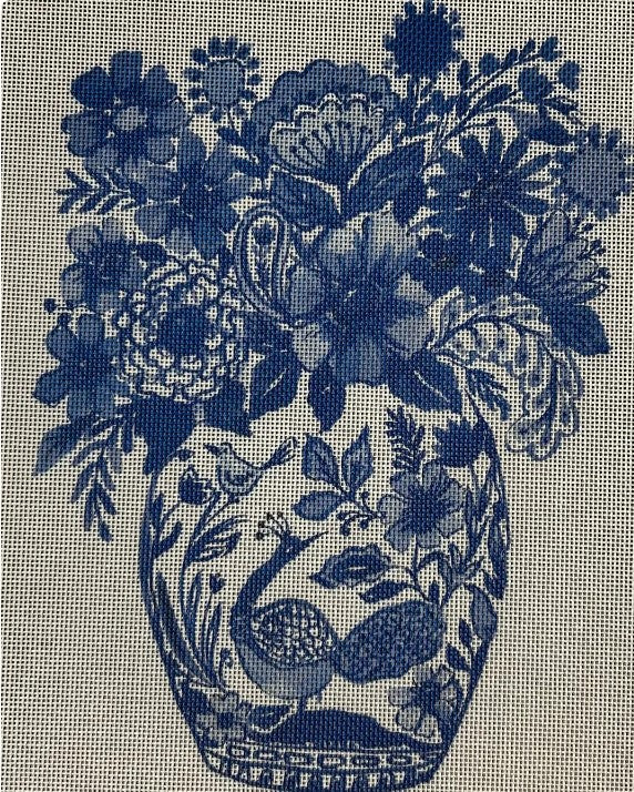 Blue Vase With Bunch of Blue Flowers